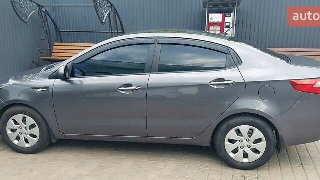 Серый Киа Рио, объемом двигателя 1.4 л и пробегом 150 тыс. км за 8600 $, фото 4 на Automoto.ua