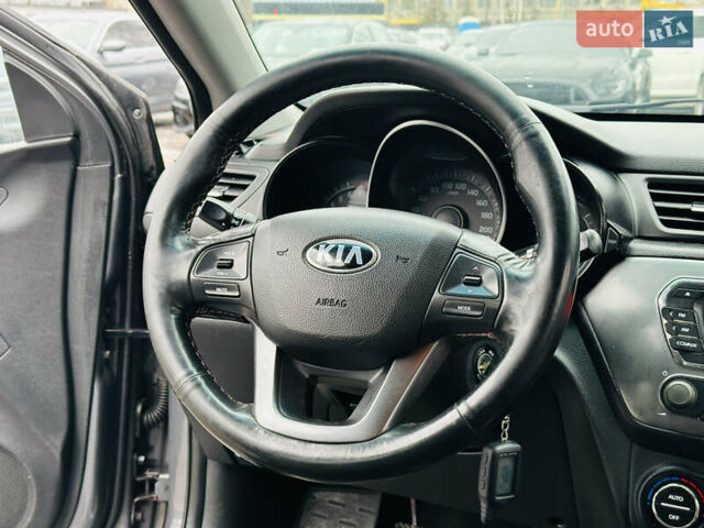 Серый Киа Рио, объемом двигателя 1.4 л и пробегом 245 тыс. км за 5900 $, фото 20 на Automoto.ua