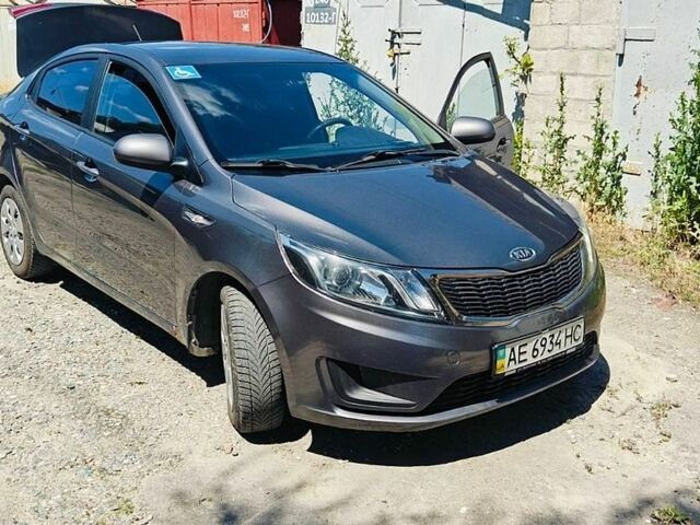 Серый Киа Рио, объемом двигателя 1.4 л и пробегом 190 тыс. км за 7000 $, фото 1 на Automoto.ua