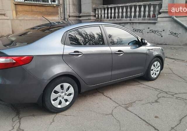 Серый Киа Рио, объемом двигателя 1.4 л и пробегом 68 тыс. км за 9000 $, фото 1 на Automoto.ua