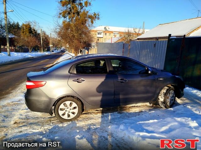 Серый Киа Рио, объемом двигателя 1.4 л и пробегом 24500 тыс. км за 5500 $, фото 2 на Automoto.ua