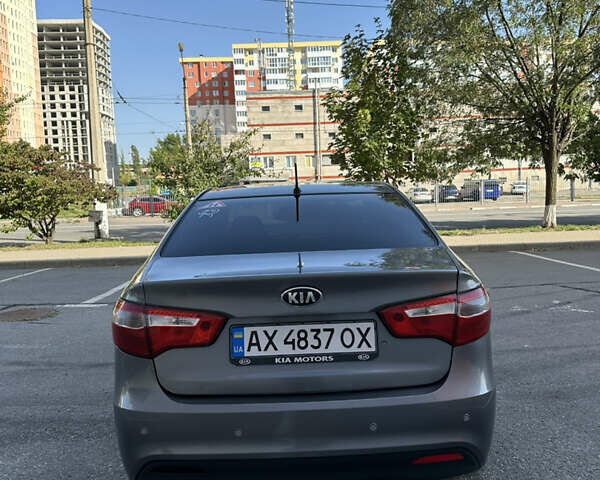 Серый Киа Рио, объемом двигателя 1.4 л и пробегом 137 тыс. км за 8300 $, фото 3 на Automoto.ua