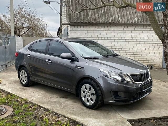 Серый Киа Рио, объемом двигателя 1.4 л и пробегом 195 тыс. км за 6500 $, фото 2 на Automoto.ua