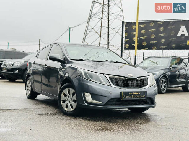 Серый Киа Рио, объемом двигателя 1.4 л и пробегом 245 тыс. км за 5900 $, фото 2 на Automoto.ua