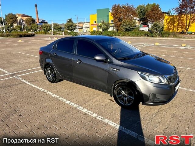 Серый Киа Рио, объемом двигателя 1.4 л и пробегом 75 тыс. км за 9100 $, фото 2 на Automoto.ua