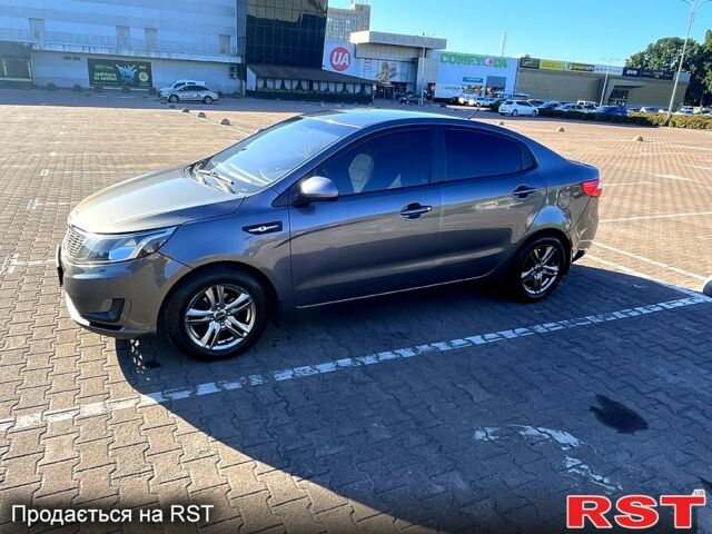 Серый Киа Рио, объемом двигателя 1.4 л и пробегом 75 тыс. км за 9100 $, фото 1 на Automoto.ua