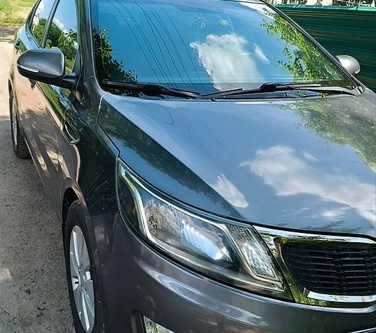 Сірий Кіа Ріо, об'ємом двигуна 1.6 л та пробігом 194 тис. км за 7800 $, фото 5 на Automoto.ua