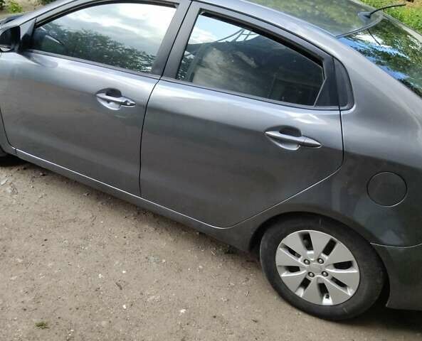 Серый Киа Рио, объемом двигателя 1.6 л и пробегом 113 тыс. км за 6200 $, фото 3 на Automoto.ua