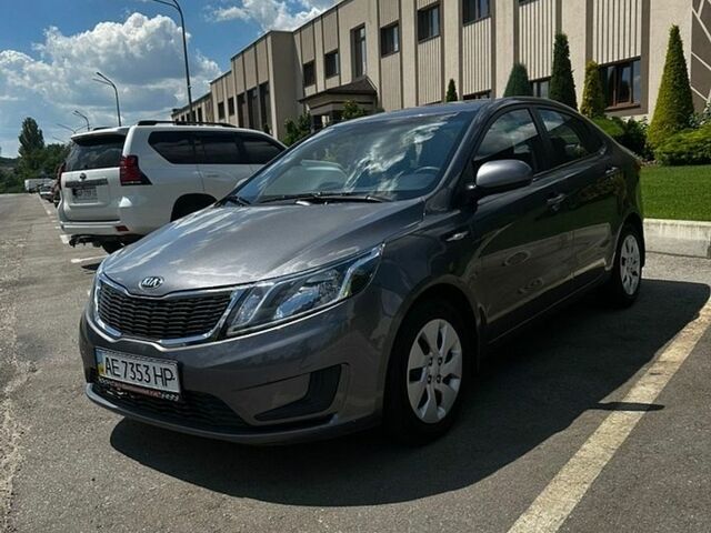 Серый Киа Рио, объемом двигателя 1.4 л и пробегом 30 тыс. км за 9900 $, фото 1 на Automoto.ua