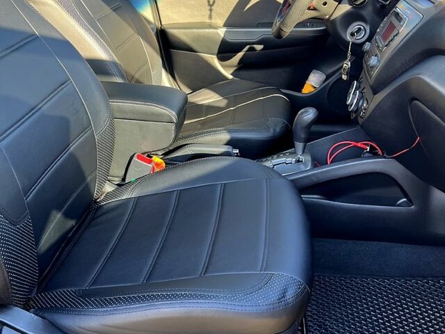 Серый Киа Рио, объемом двигателя 1.4 л и пробегом 75 тыс. км за 9100 $, фото 4 на Automoto.ua