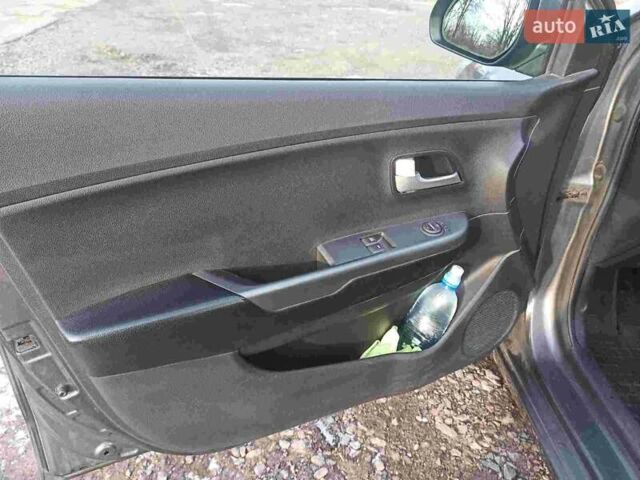 Серый Киа Рио, объемом двигателя 1.4 л и пробегом 70 тыс. км за 9000 $, фото 27 на Automoto.ua
