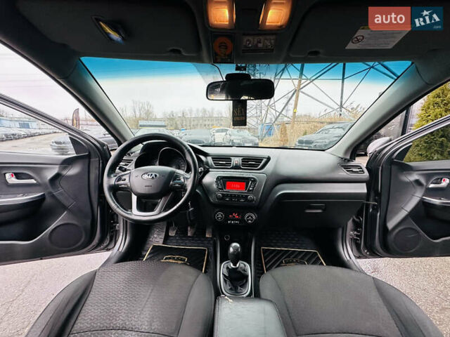 Серый Киа Рио, объемом двигателя 1.4 л и пробегом 245 тыс. км за 5900 $, фото 18 на Automoto.ua
