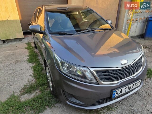 Серый Киа Рио, объемом двигателя 1.4 л и пробегом 188 тыс. км за 8500 $, фото 2 на Automoto.ua