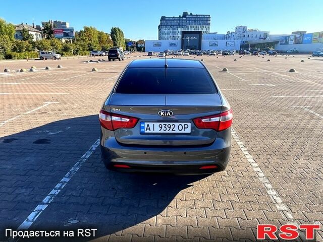 Серый Киа Рио, объемом двигателя 1.4 л и пробегом 75 тыс. км за 9100 $, фото 3 на Automoto.ua