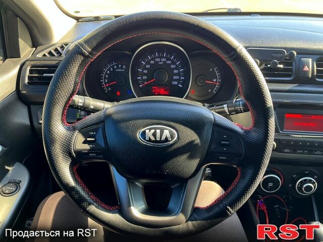 Серый Киа Рио, объемом двигателя 1.4 л и пробегом 75 тыс. км за 9100 $, фото 7 на Automoto.ua