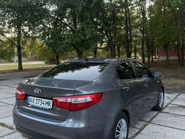 Сірий Кіа Ріо, об'ємом двигуна 1.4 л та пробігом 202 тис. км за 6500 $, фото 2 на Automoto.ua