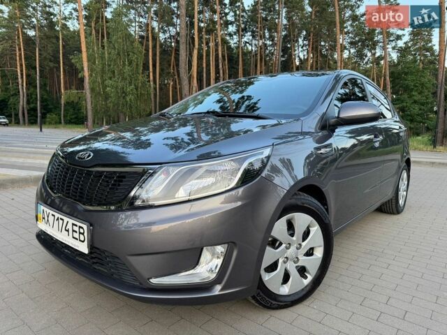 Серый Киа Рио, объемом двигателя 1.4 л и пробегом 87 тыс. км за 8950 $, фото 2 на Automoto.ua