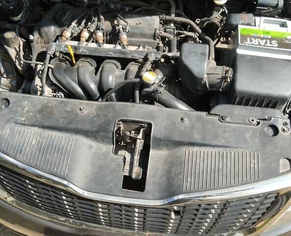 Серый Киа Рио, объемом двигателя 1.6 л и пробегом 113 тыс. км за 6200 $, фото 4 на Automoto.ua