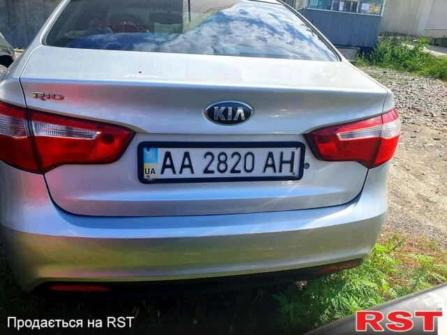 Серый Киа Рио, объемом двигателя 1.4 л и пробегом 145 тыс. км за 8210 $, фото 3 на Automoto.ua