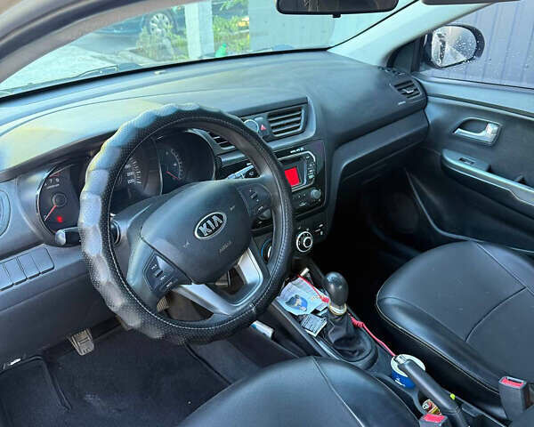 Серый Киа Рио, объемом двигателя 1.4 л и пробегом 223 тыс. км за 7399 $, фото 4 на Automoto.ua