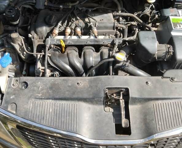 Серый Киа Рио, объемом двигателя 1.6 л и пробегом 113 тыс. км за 6200 $, фото 5 на Automoto.ua