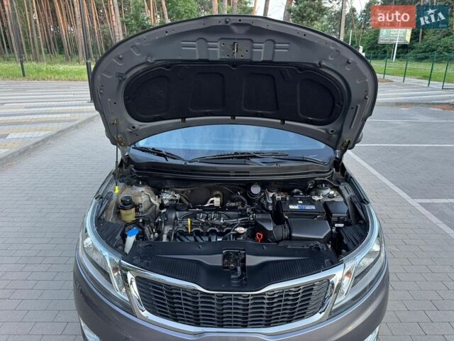 Серый Киа Рио, объемом двигателя 1.4 л и пробегом 87 тыс. км за 8950 $, фото 68 на Automoto.ua