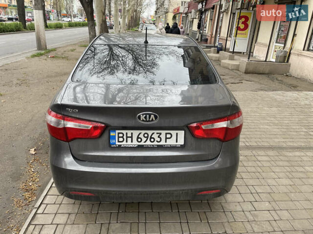 Серый Киа Рио, объемом двигателя 1.59 л и пробегом 165 тыс. км за 8000 $, фото 3 на Automoto.ua