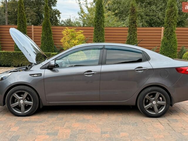 Серый Киа Рио, объемом двигателя 1.4 л и пробегом 91 тыс. км за 8450 $, фото 13 на Automoto.ua