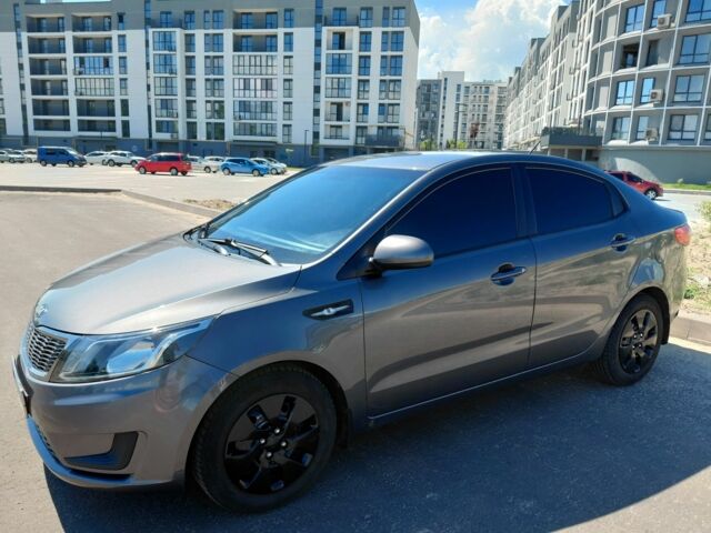 Серый Киа Рио, объемом двигателя 1.4 л и пробегом 98 тыс. км за 8564 $, фото 4 на Automoto.ua