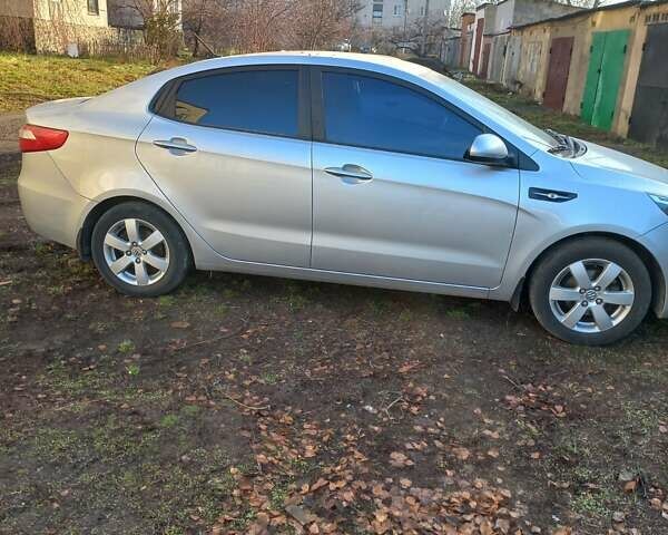 Серый Киа Рио, объемом двигателя 1.4 л и пробегом 53 тыс. км за 8300 $, фото 7 на Automoto.ua