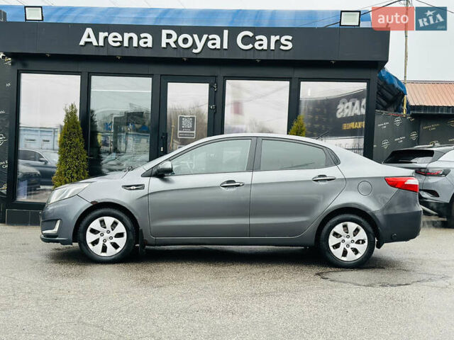 Серый Киа Рио, объемом двигателя 1.4 л и пробегом 245 тыс. км за 5900 $, фото 4 на Automoto.ua