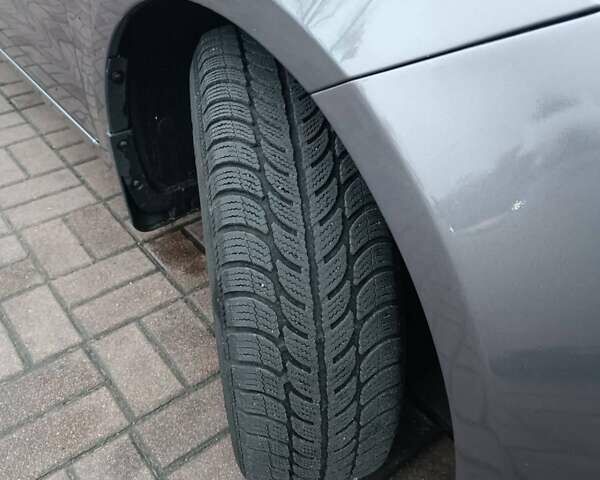 Серый Киа Рио, объемом двигателя 1.4 л и пробегом 190 тыс. км за 9000 $, фото 4 на Automoto.ua