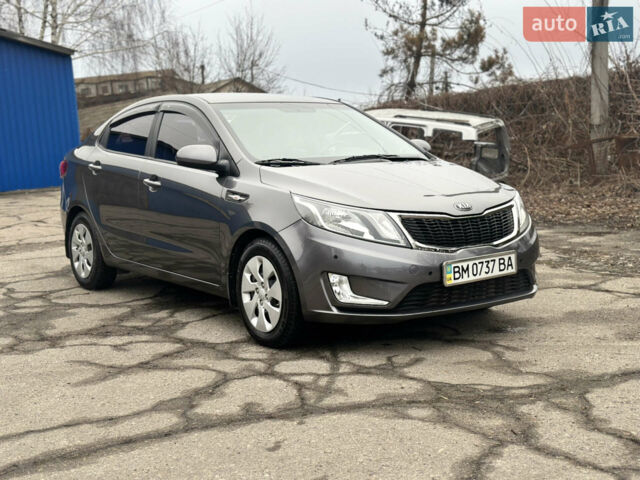 Серый Киа Рио, объемом двигателя 1.4 л и пробегом 43 тыс. км за 10500 $, фото 2 на Automoto.ua