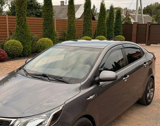 Серый Киа Рио, объемом двигателя 1.4 л и пробегом 91 тыс. км за 8450 $, фото 11 на Automoto.ua