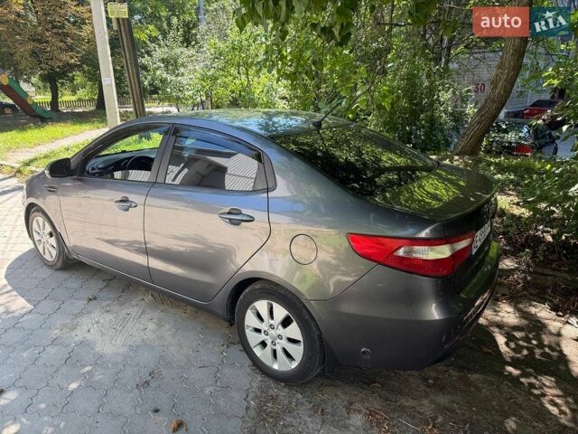 Серый Киа Рио, объемом двигателя 1.59 л и пробегом 258 тыс. км за 5600 $, фото 2 на Automoto.ua