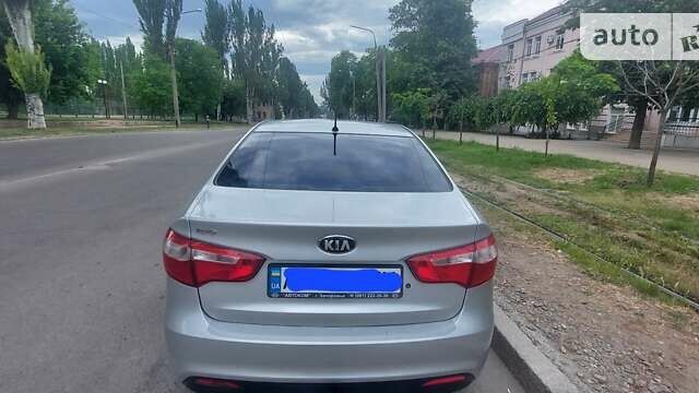 Сірий Кіа Ріо, об'ємом двигуна 1.4 л та пробігом 143 тис. км за 8200 $, фото 4 на Automoto.ua