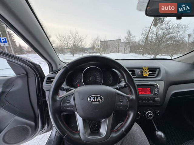 Серый Киа Рио, объемом двигателя 1.4 л и пробегом 260 тыс. км за 7799 $, фото 16 на Automoto.ua