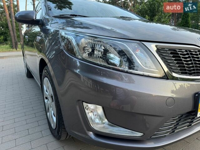 Серый Киа Рио, объемом двигателя 1.4 л и пробегом 87 тыс. км за 8950 $, фото 23 на Automoto.ua