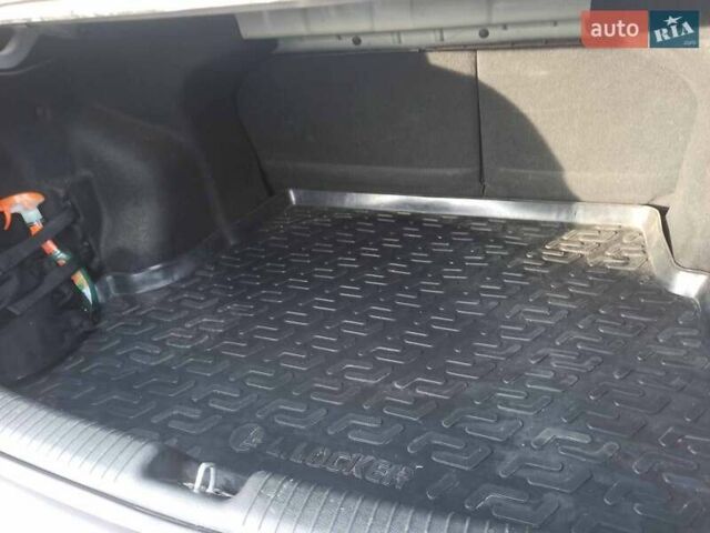 Серый Киа Рио, объемом двигателя 1.4 л и пробегом 70 тыс. км за 9000 $, фото 62 на Automoto.ua