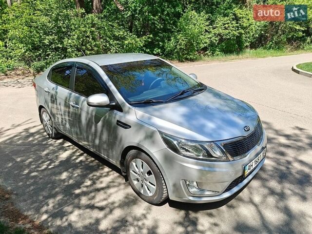 Серый Киа Рио, объемом двигателя 1.6 л и пробегом 130 тыс. км за 8000 $, фото 5 на Automoto.ua