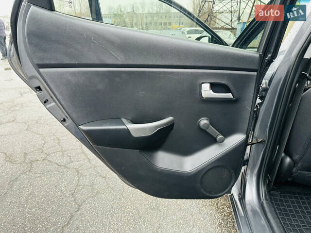 Серый Киа Рио, объемом двигателя 1.4 л и пробегом 245 тыс. км за 5900 $, фото 16 на Automoto.ua