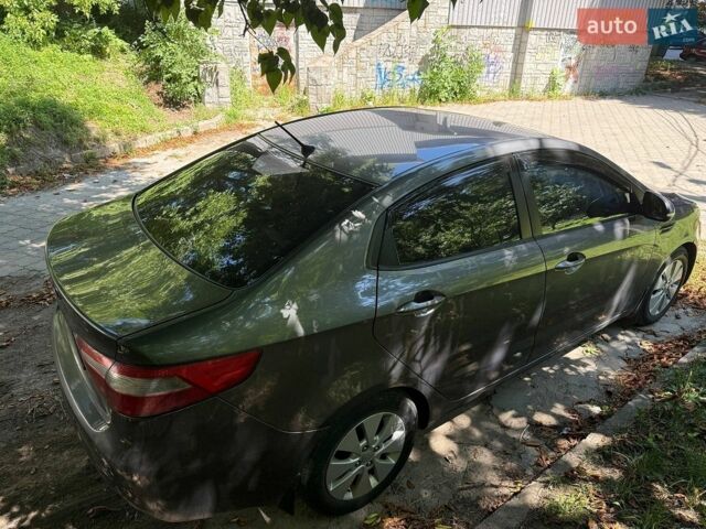 Серый Киа Рио, объемом двигателя 1.59 л и пробегом 258 тыс. км за 5600 $, фото 1 на Automoto.ua