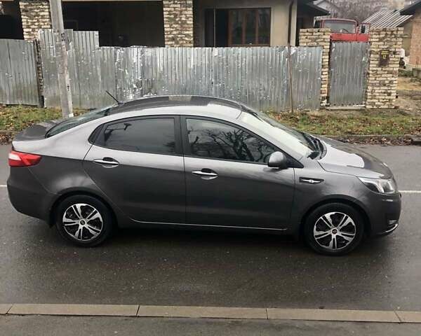 Серый Киа Рио, объемом двигателя 1.4 л и пробегом 265 тыс. км за 6100 $, фото 4 на Automoto.ua
