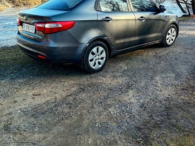 Серый Киа Рио, объемом двигателя 1.4 л и пробегом 300 тыс. км за 5200 $, фото 2 на Automoto.ua