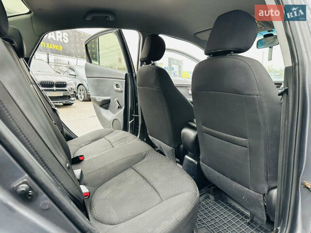 Серый Киа Рио, объемом двигателя 1.4 л и пробегом 245 тыс. км за 5900 $, фото 17 на Automoto.ua