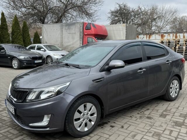 Сірий Кіа Ріо, об'ємом двигуна 1.6 л та пробігом 110 тис. км за 7900 $, фото 1 на Automoto.ua