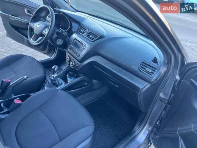 Серый Киа Рио, объемом двигателя 1.4 л и пробегом 160 тыс. км за 6700 $, фото 11 на Automoto.ua