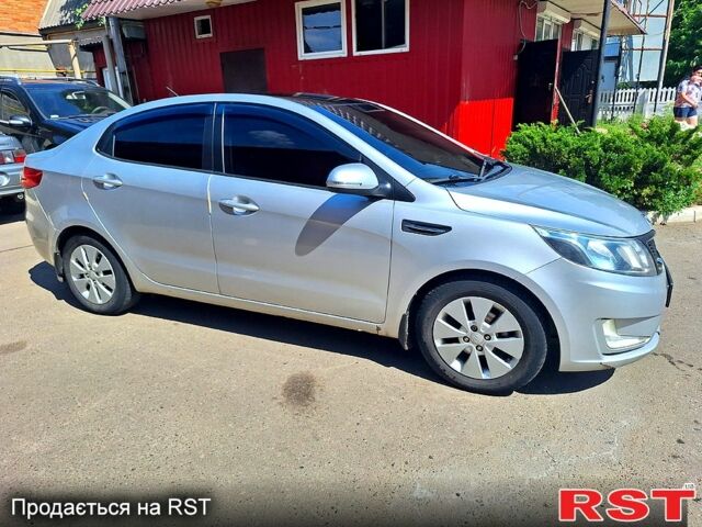 Серый Киа Рио, объемом двигателя 1.6 л и пробегом 157 тыс. км за 8500 $, фото 2 на Automoto.ua