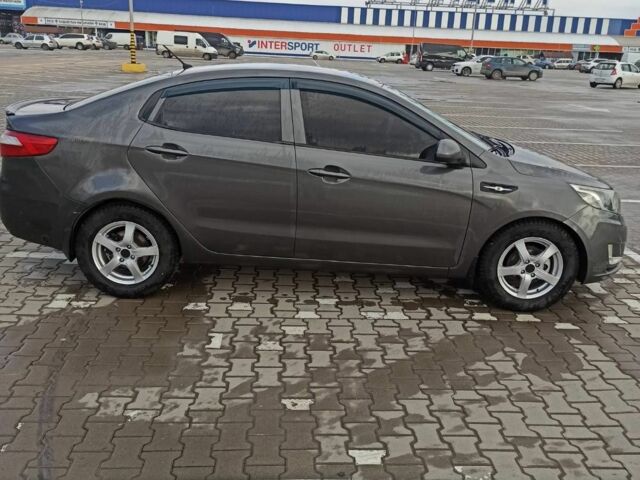 Сірий Кіа Ріо, об'ємом двигуна 1.4 л та пробігом 130 тис. км за 6500 $, фото 3 на Automoto.ua