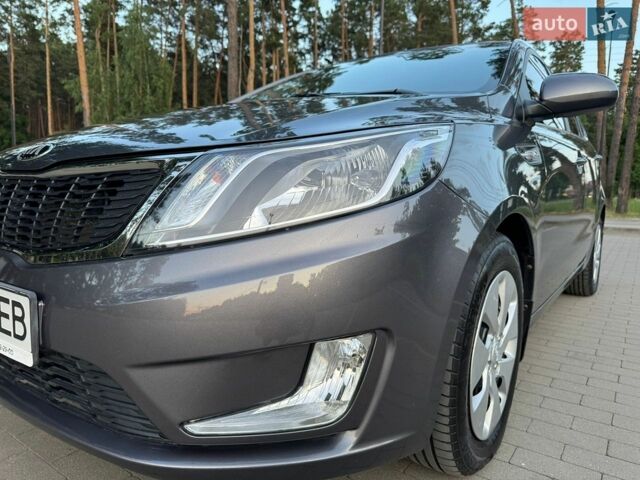 Серый Киа Рио, объемом двигателя 1.4 л и пробегом 87 тыс. км за 8950 $, фото 25 на Automoto.ua